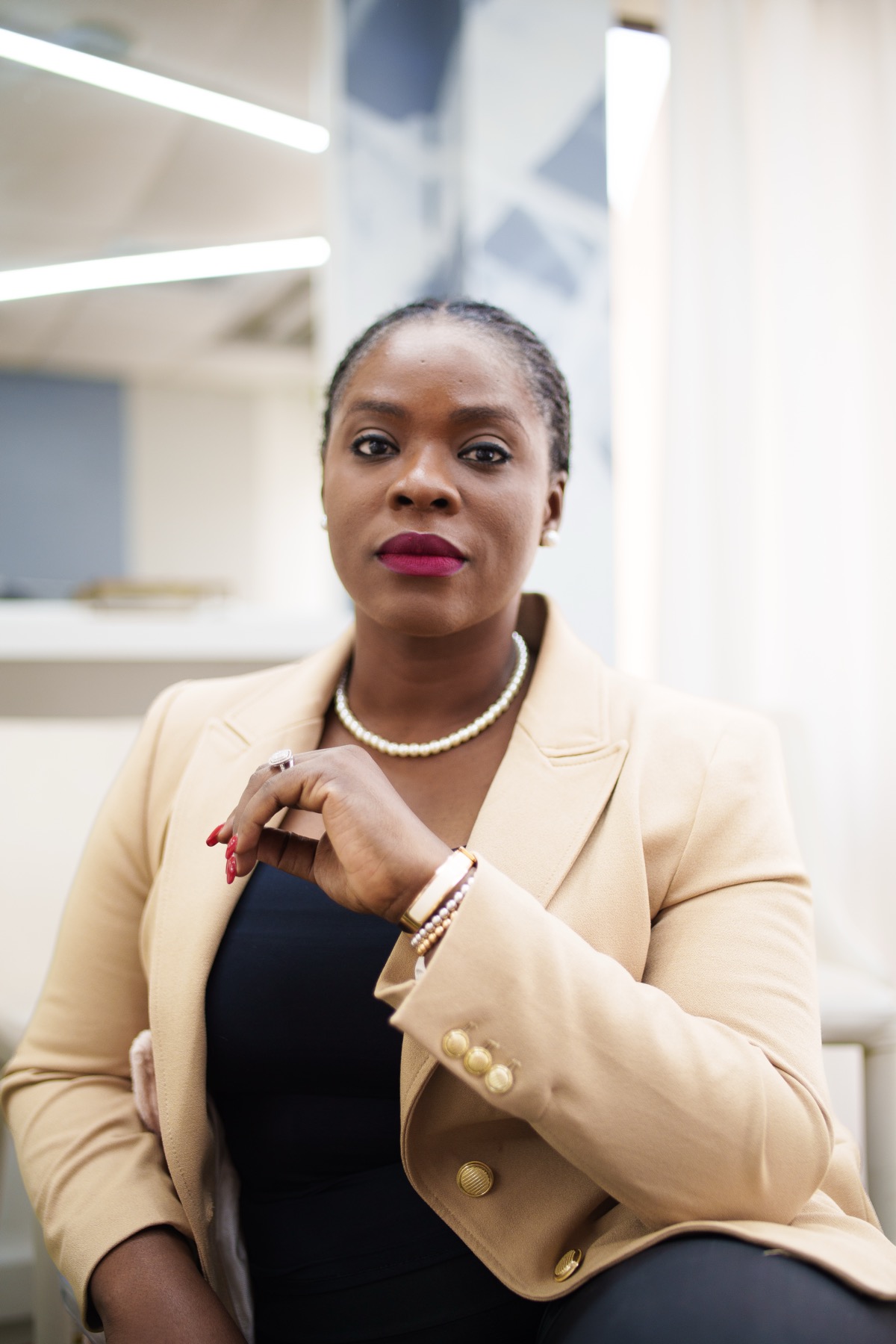 Chika Idoko in a gold blazer